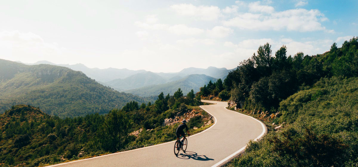 solitary biker on his cycling holiday in Spain and on the Costa Blanca 